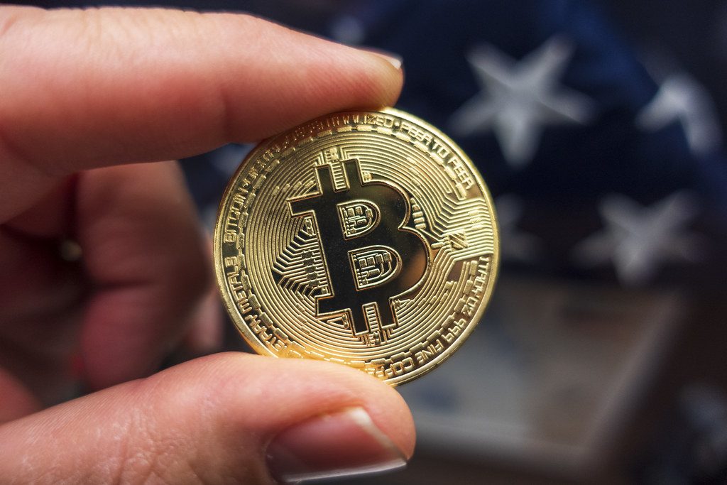 crypto market tumbles as bitcoin slips from record peak
